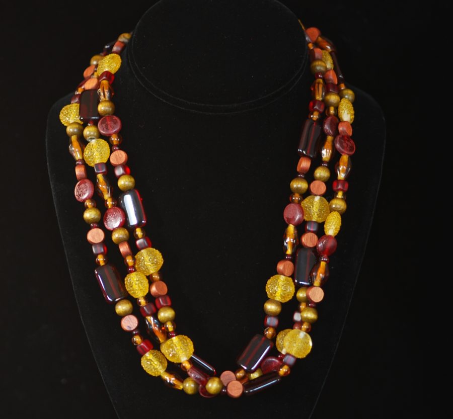 Art glass and wood bead three strand necklace with silver clasp