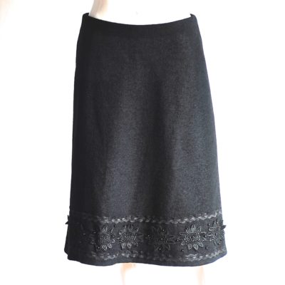 Khefer black wool skirt with beaded applique at the bottom, made in Italy