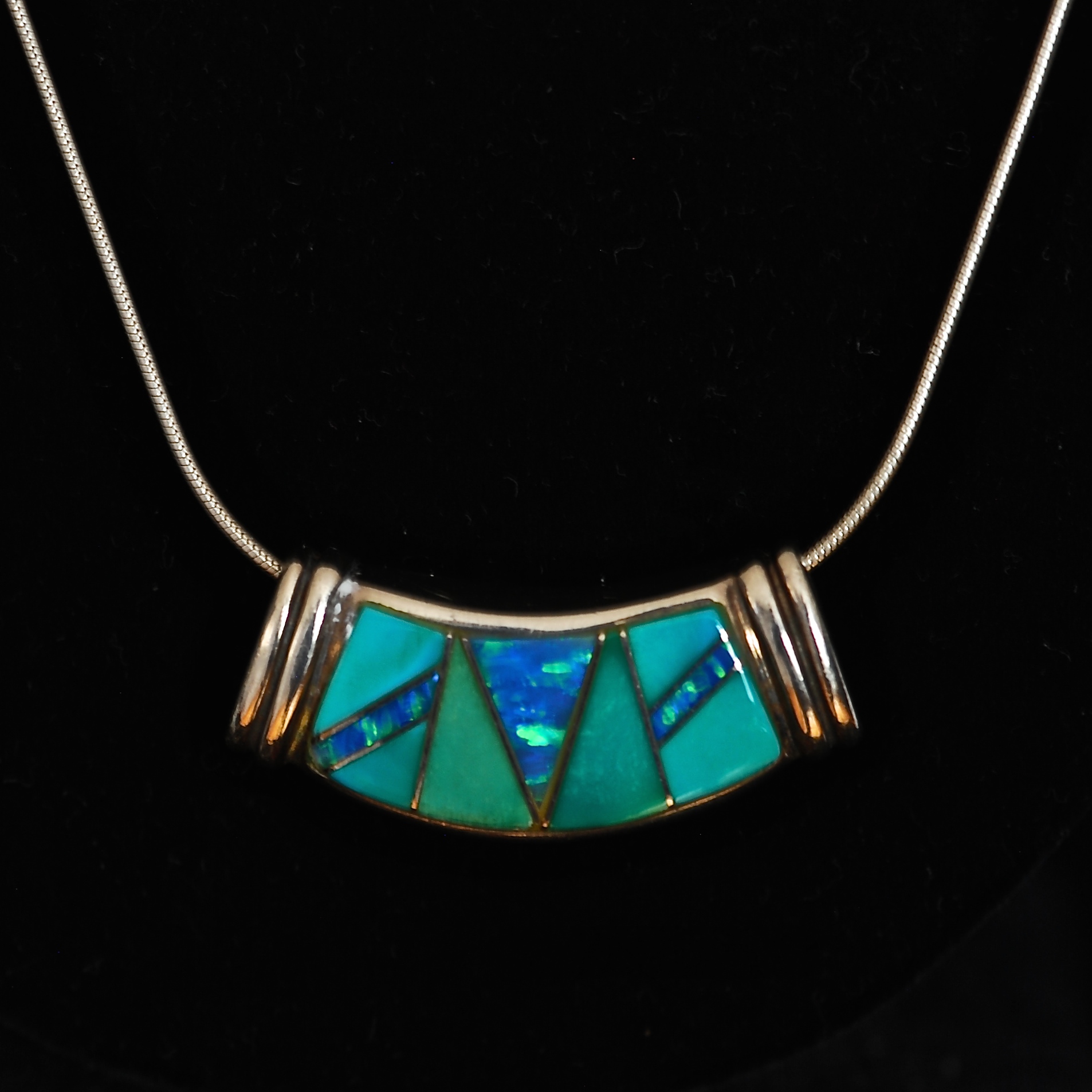 Sterling Silver Pendant Necklace Featuring Inlaid Turquoise Opal